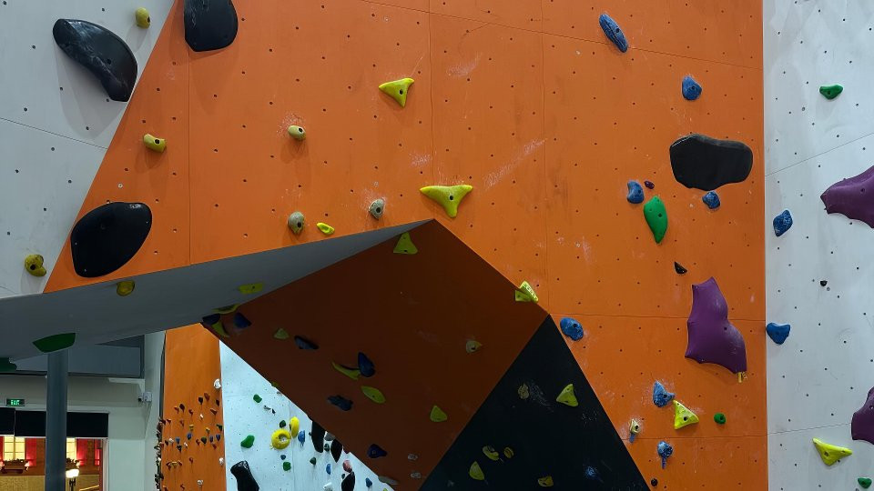 Colourful indoor climbing walls at Adventure World, Muscat Mall