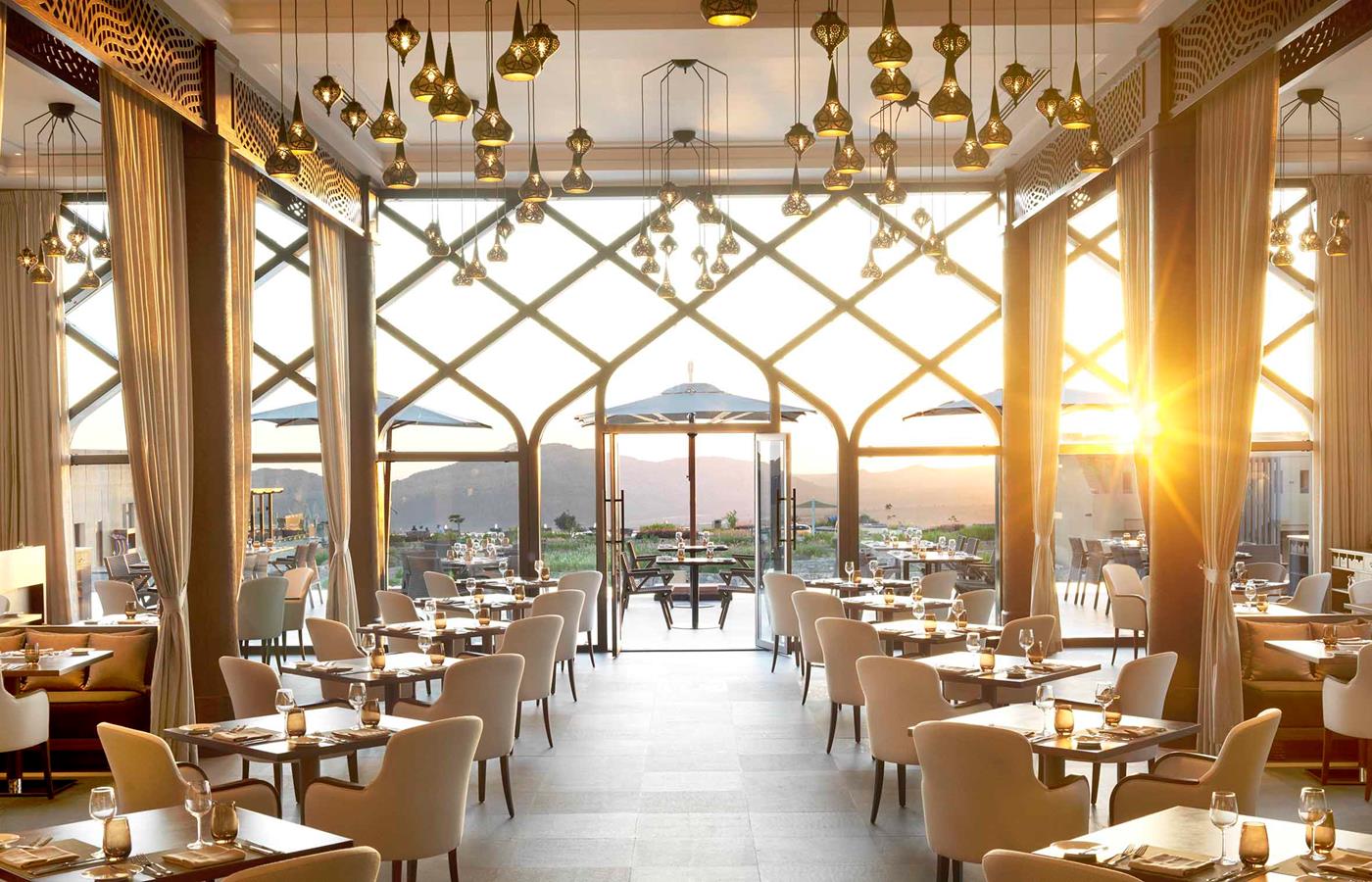 Al Maisan restaurant dining room at Anantara Al Jabal Al Akhdar with mountain views