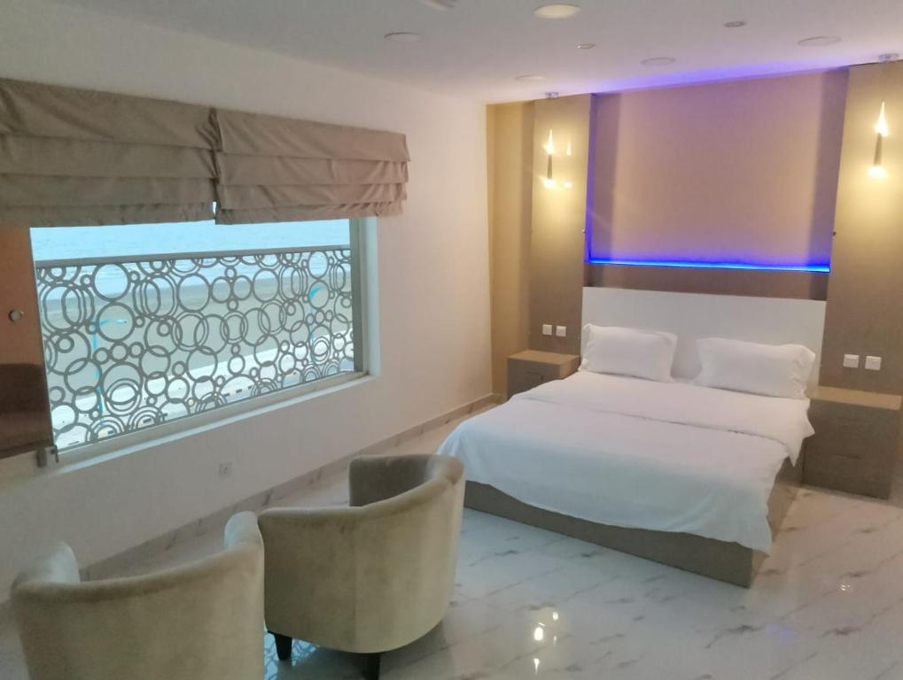 Bedroom at Marina H Hotel