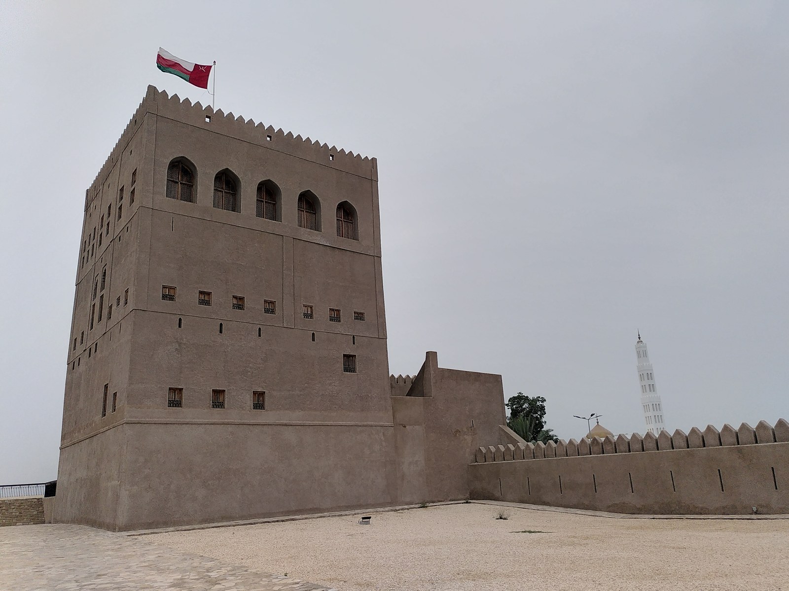 The white towers and courtyard of Sohar Fort