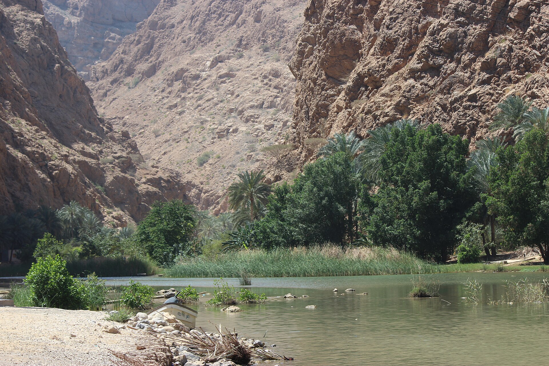 Turquoise pools between the canyon walls of Wadi Shab